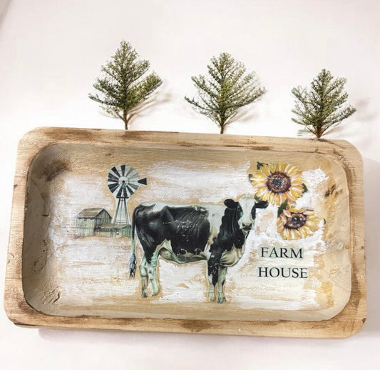 Wooden tray with a cow, sunflowers, and windmill design on a white background